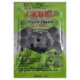 A 200g green vacuum-sealed pack of Cebel - Black Olives with pit, labeled in Turkish, German, and English. Features a clear window to see the olives—ideal for Mediterranean recipes.